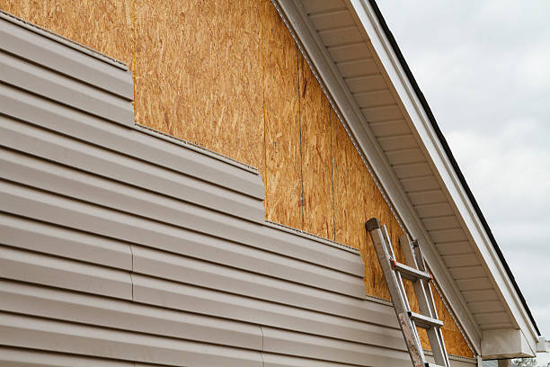 Professional Siding Inspection technician working in Valley Stream, NY